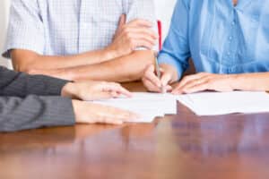 Senior Couple In A Meeting With Financial Advisor.